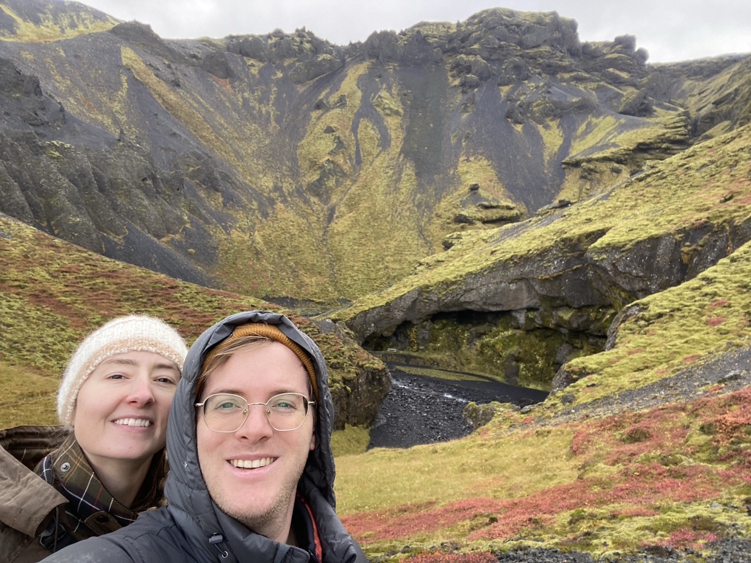 Two travelers in a mossy Thorsmork bowl