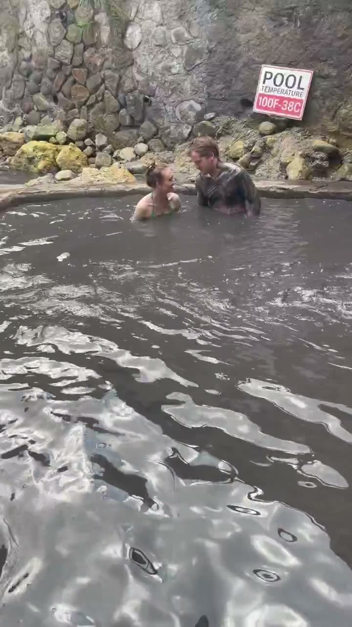 Soaking in the warm mud at Sulfur Springs — a toasty 100°F.